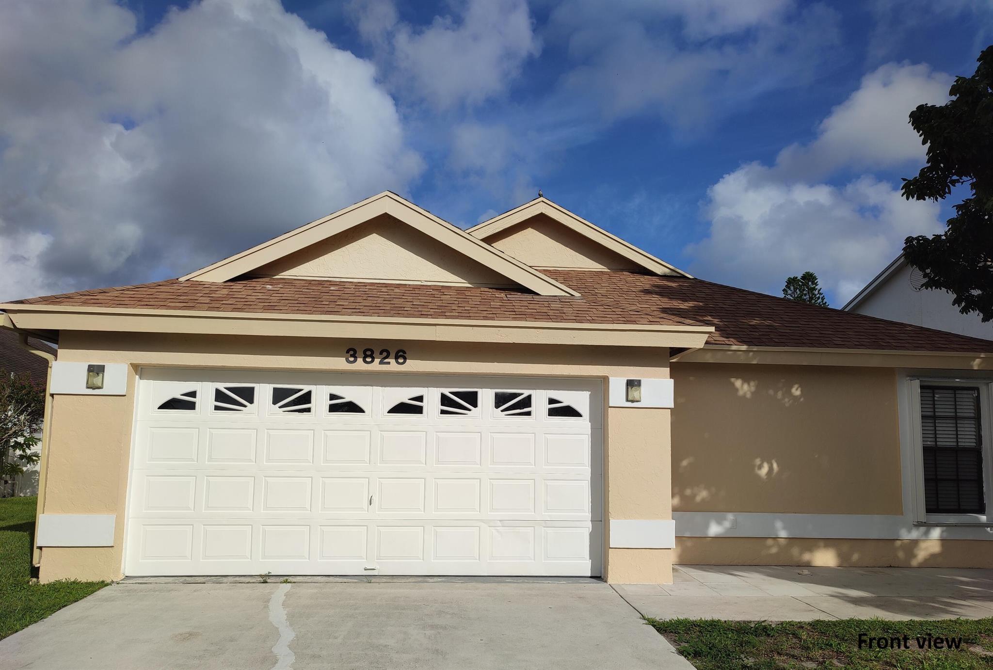Convenient Location!! Situated near I-95, Downtown West Palm Beach/CityPlace, PBI Airport, shopping, restaurants, parks, schools, andmore! This spacious and bright one-story home offers 3 bedrooms, 2 bathrooms, and a 2-car garage with a beautiful lake view. Recently renovated with fresh interior paint and tile flooring throughout, the property also features: Brand new bathrooms, Volume ceilings, Extra storage room, Washer and dryer inside the garage, Screened covered porch and open patio Pet-friendly: One small pet allowed with a $250 non-refundable pet fee. Requirement: Tenant must provide renter's insurance with pet liability coverage.
