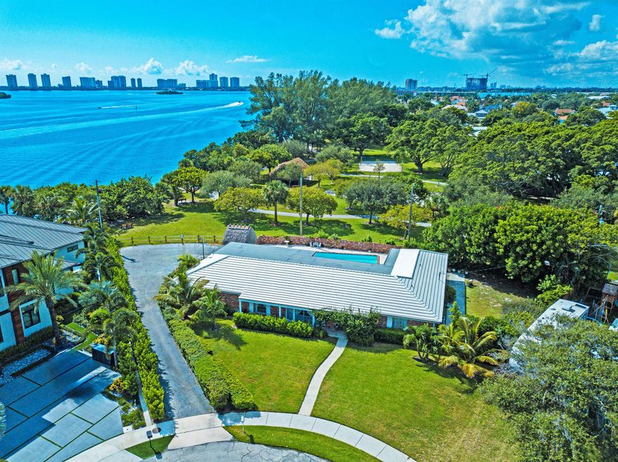 One of North Palm Beaches most unique property is situated on Lakeside Circle with views of the  Intracoastal Waterway. Home is original, could be renovated.