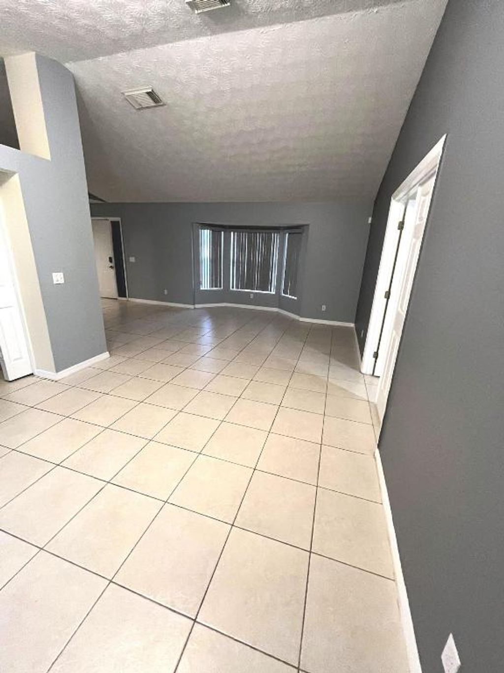 Photo of 1122 SE Puritan Lane, Port Saint Lucie, FL 34983 (MLS # R10963284)