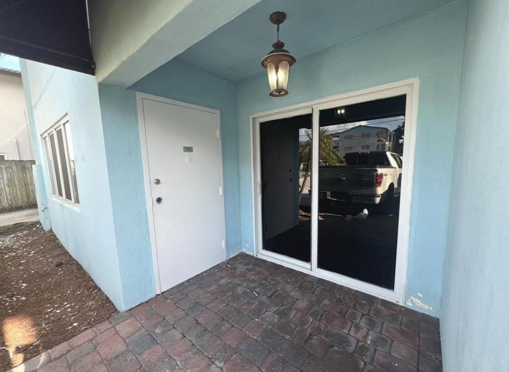 Photo of 1060 Crystal Lake Drive #101, Deerfield Beach, FL 33064 (MLS # B26014152)