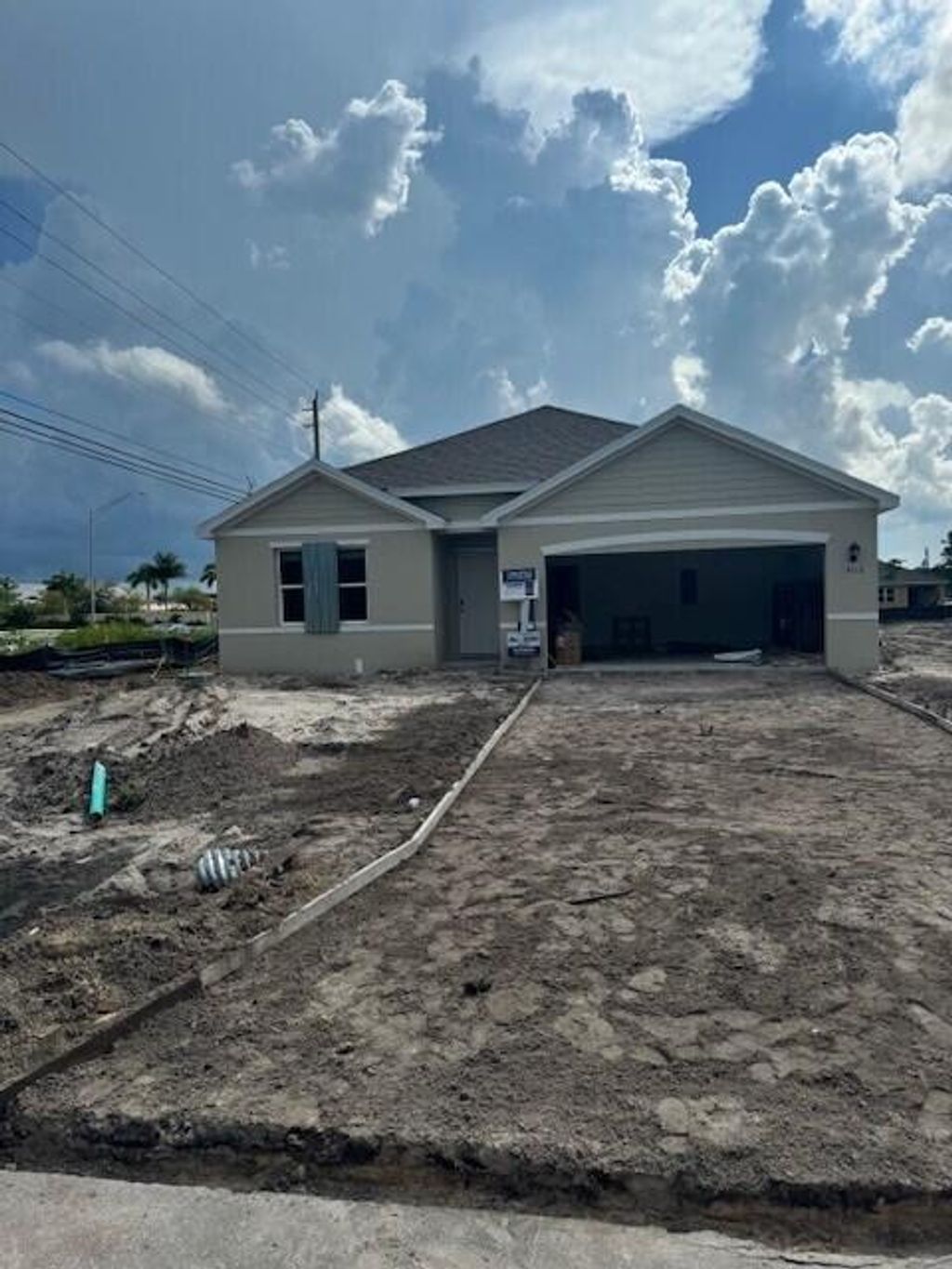 Photo of 902 SW Cairo Avenue, Port Saint Lucie, FL 34953 (MLS # R11001092)