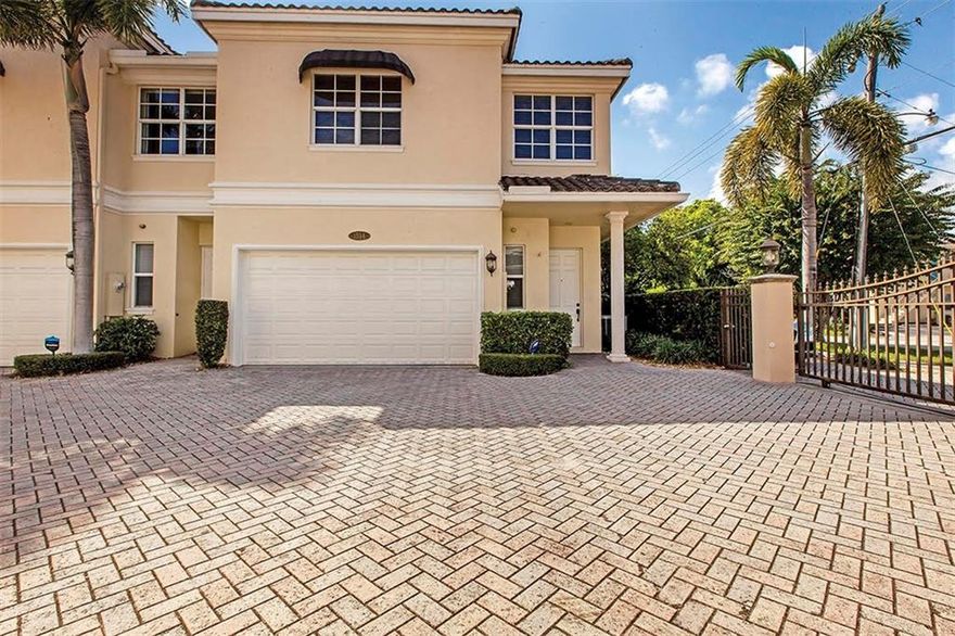 Your next home is only minutes to Holiday Park, shopping, restaurants, fitness centers & Ft. Ld. Beach. This rarely available corner unit townhome in the gated complex of the Enclave II boasts a bright open floor plan with volume ceilings. Ideal for entertaining with an open kitchen & center island that overlooks the breakfast area, great room &  dining room. Enjoy the tropical lifestyle with access to your large private L shaped backyard highlighted by a covered porch. An open stairway accesses the 2nd floor with a full size side by side washer & dryer. The luminous & enormous primary suite is the ultimate retreat with a private covered balcony, custom walk-in closet & large bathroom. The 2nd & 3rd bdrms. (3rd br is currently used as an open loft) share a full bathroom. Sq. Ft. from IMAPP