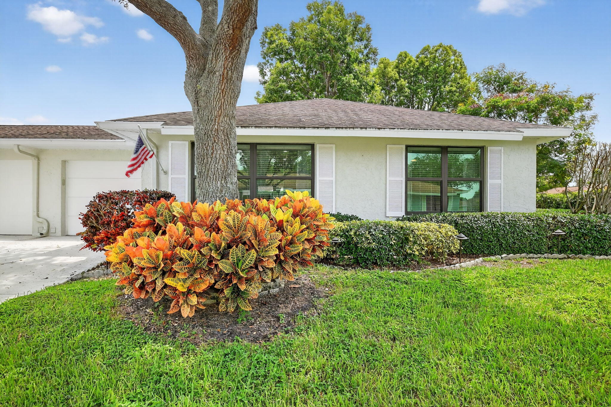 Welcome home to this tastefully updated two bedroom, two bathroom corner unit in Bent Tree Villas East, . Enjoy the Florida lifestyle in this light and bright villa which offers an open floor plan with spacious living and dining area perfect for entertaining. Kitchen has been updated with granite countertops, a center island, stainless steel appliances and a large pantry. Home has beautiful, neutral, tile wood like flooring, crown molding in all rooms, full impact windows and was freshly painted inside and out. Bent Tree Villas is a 55+ Community and offers a swimming pool, bocce court, library, billiards, ballroom and meeting room. Feel secure with impact windows throughout.