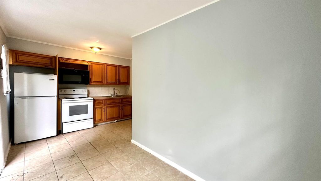 Photo of 3804 Miller Avenue #C, West Palm Beach, FL 33405 (MLS # R11146892)