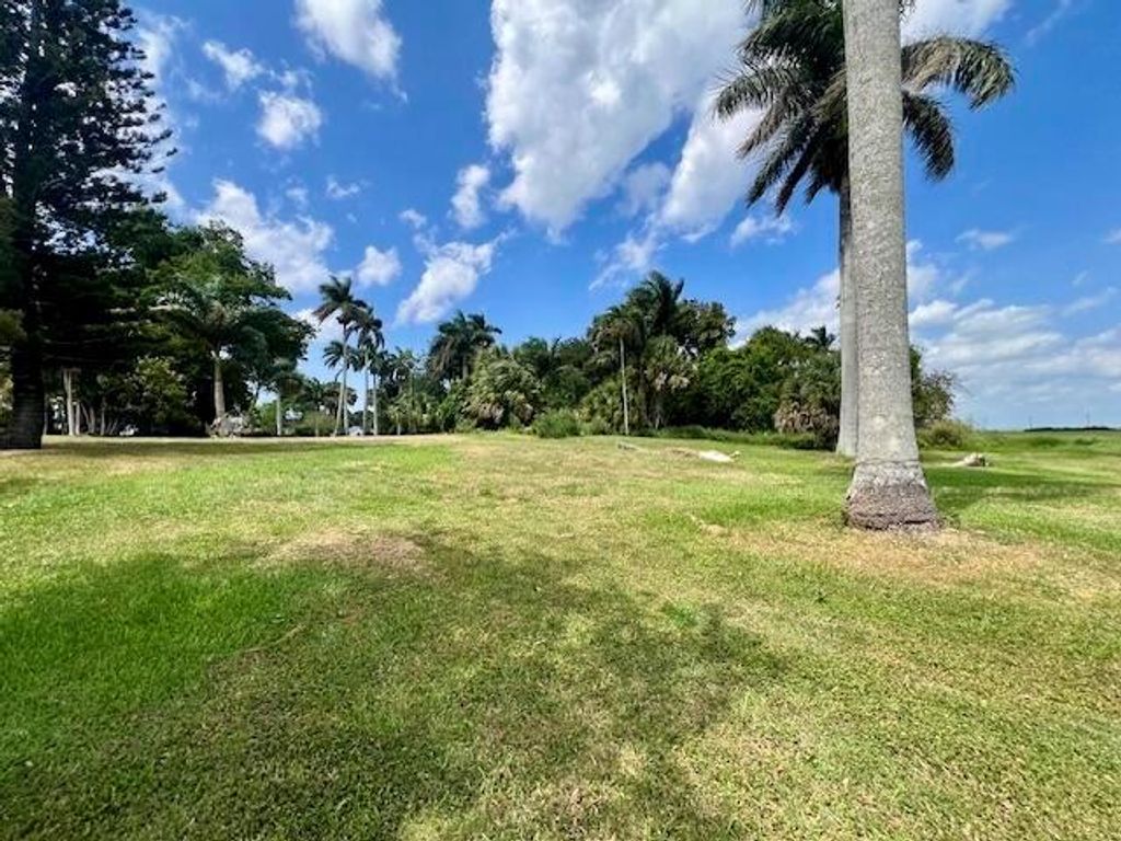 Photo of 1978 E Main Street, Pahokee, FL 33476 (MLS # R10975828)