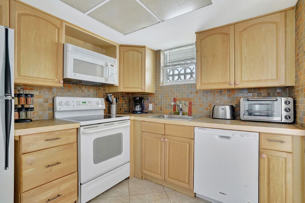 Photo of 3570 S Ocean Boulevard #511, South Palm Beach, FL 33480 (MLS # R10888854)