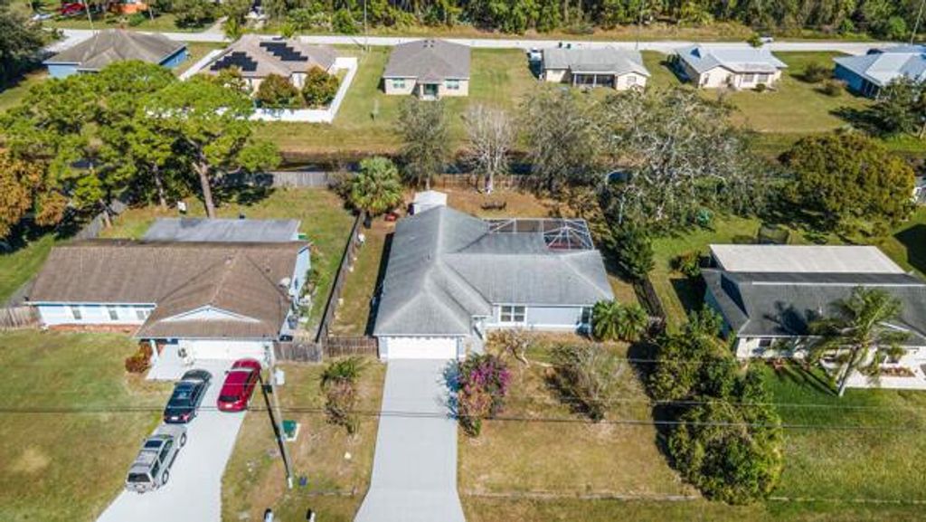 Photo of 457 SW David Terrace, Port Saint Lucie, FL 34953 (MLS # R11065457)