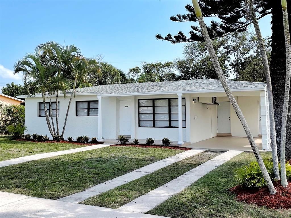 Photo of 738 Evergreen Drive, Lake Park, FL 33403 (MLS # R10710423)