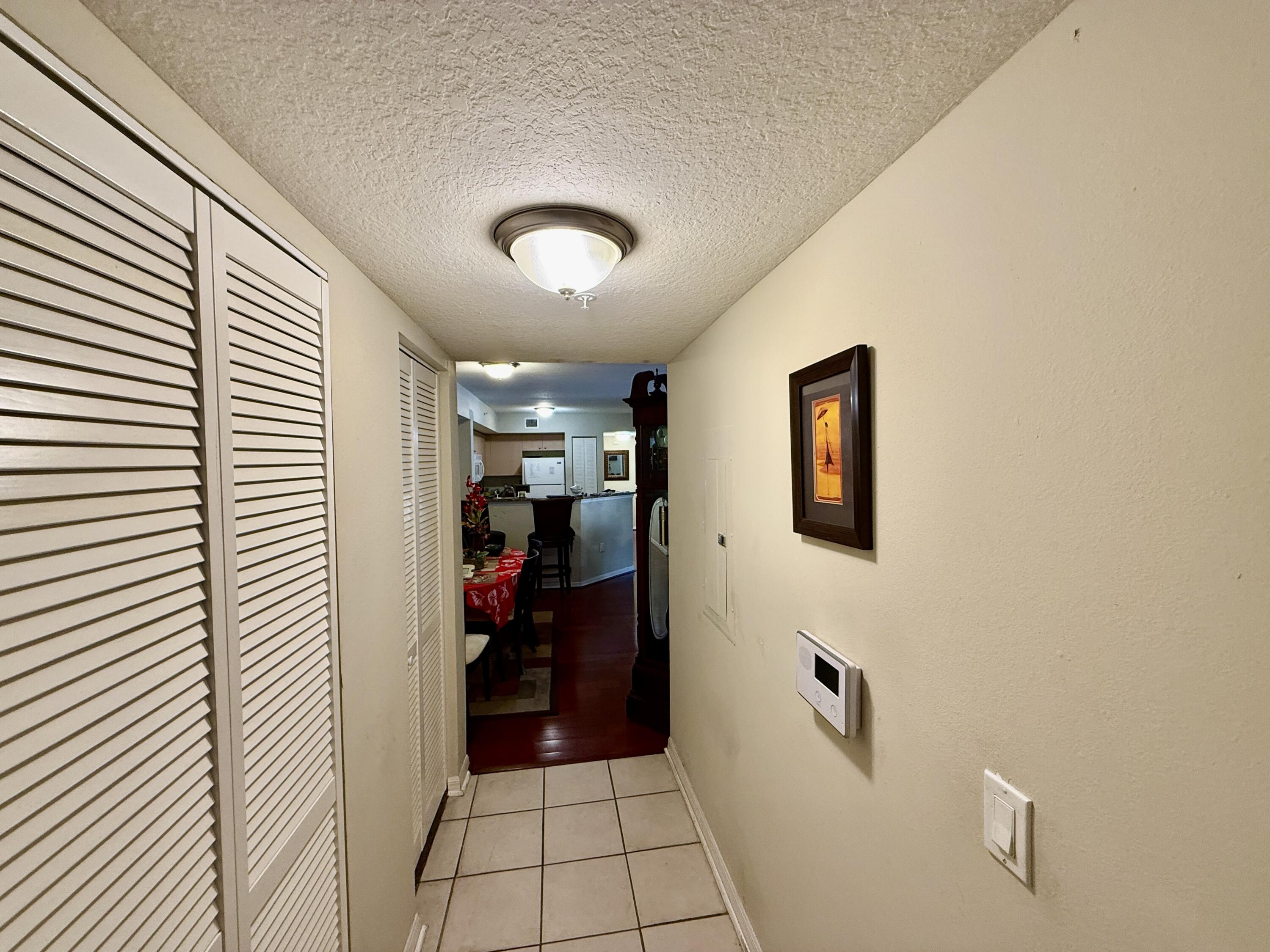 Beautifully updated 3BR/2BA second-floor condo with over 1,300 sq ft at Emerald Isle at Lakes gated community in West Palm Beach. Features include laminate floors, granite counters in kitchen & baths, updated bathroom light fixtures & shower enclosures, plus ceiling fans in all bedrooms & living room. Conveniently located near shopping, dining & major highways. Move-in ready. Schedule your showing today!