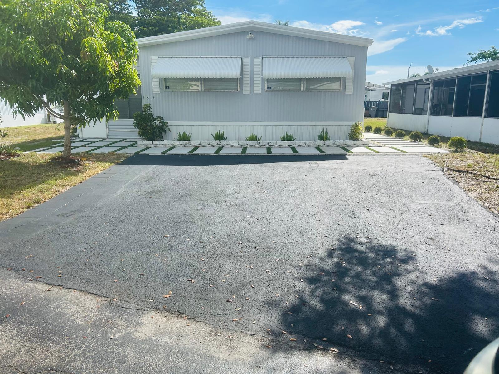 This beautifully updated home offers modern living with a brand-new gourmet kitchen featuring quartz countertops, sleek new appliances, and crisp white cabinetry. Both bathrooms have been tastefully renovated, and stylish tile flooring runs throughout the entire home.
Enjoy attractive landscaping and a welcoming community atmosphere. The land is leased, with a monthly fee of $1,050 that covers lot rent, lawn care, water, sewer, and trash. Amenities include swimming pool, clubhouse, playground, tennis courts, basketball court, sand volleyball court, little league field and community laundromat. Nice location in Boynton Beach nearby lots of great places to eat and shop.
