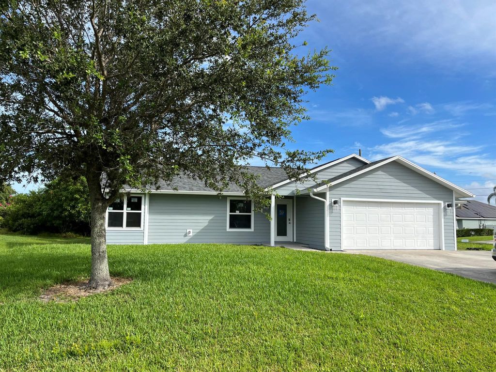 Photo of 501 SW Baoy Avenue, Port St Lucie, FL 34953 (MLS # R10922566)