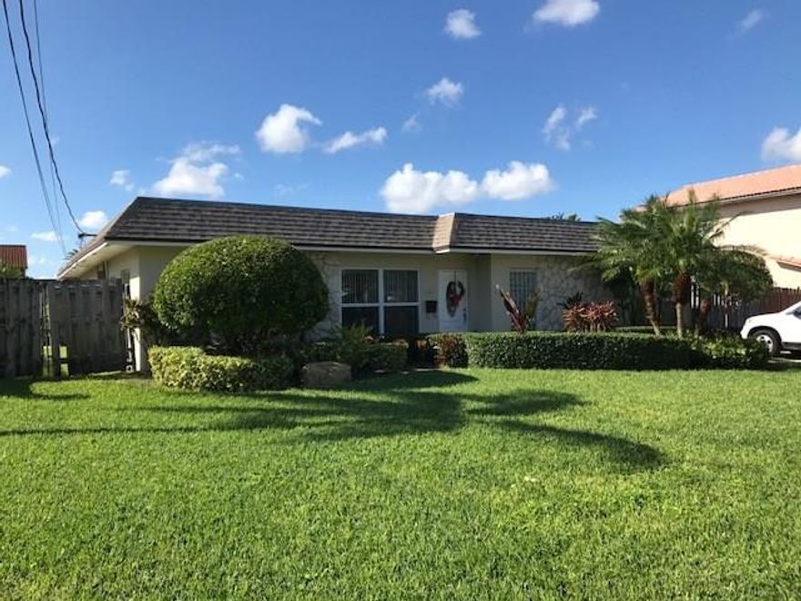 Large and attractively landscaped 4/2 waterfront home with a pool and a 9,000 pound boat lift, just minutes to the ocean with only one fixed bridge at US#1. Huge patio and dock area. New impact windows, newer Central Air, On demand water heater, Parking for boat trailer or RV behind a fence on North side.  Rent includes pool and yard service