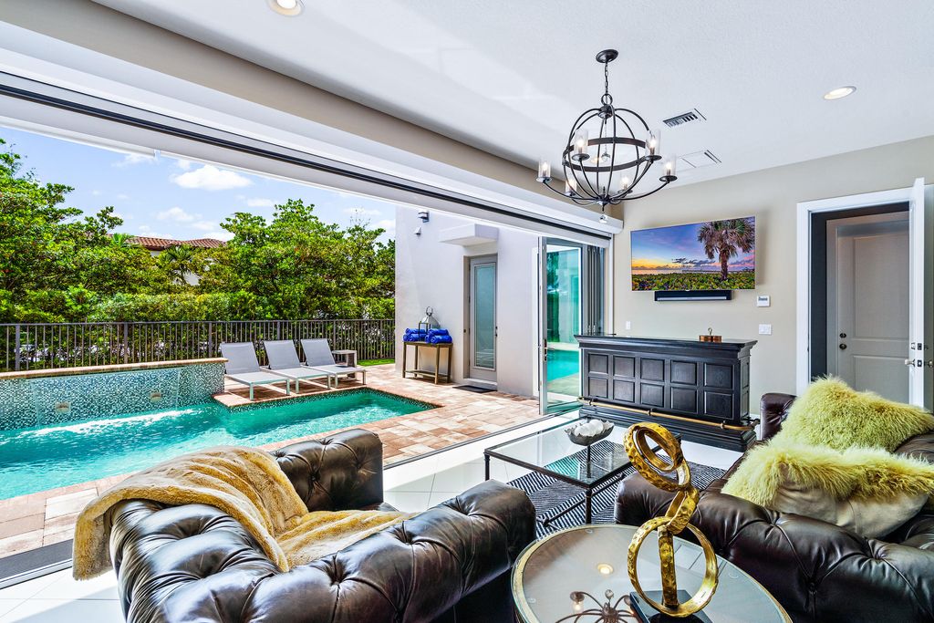 Photo of 5037 Grandiflora Road, Palm Beach Gardens, FL 33418 (MLS # R10783627)