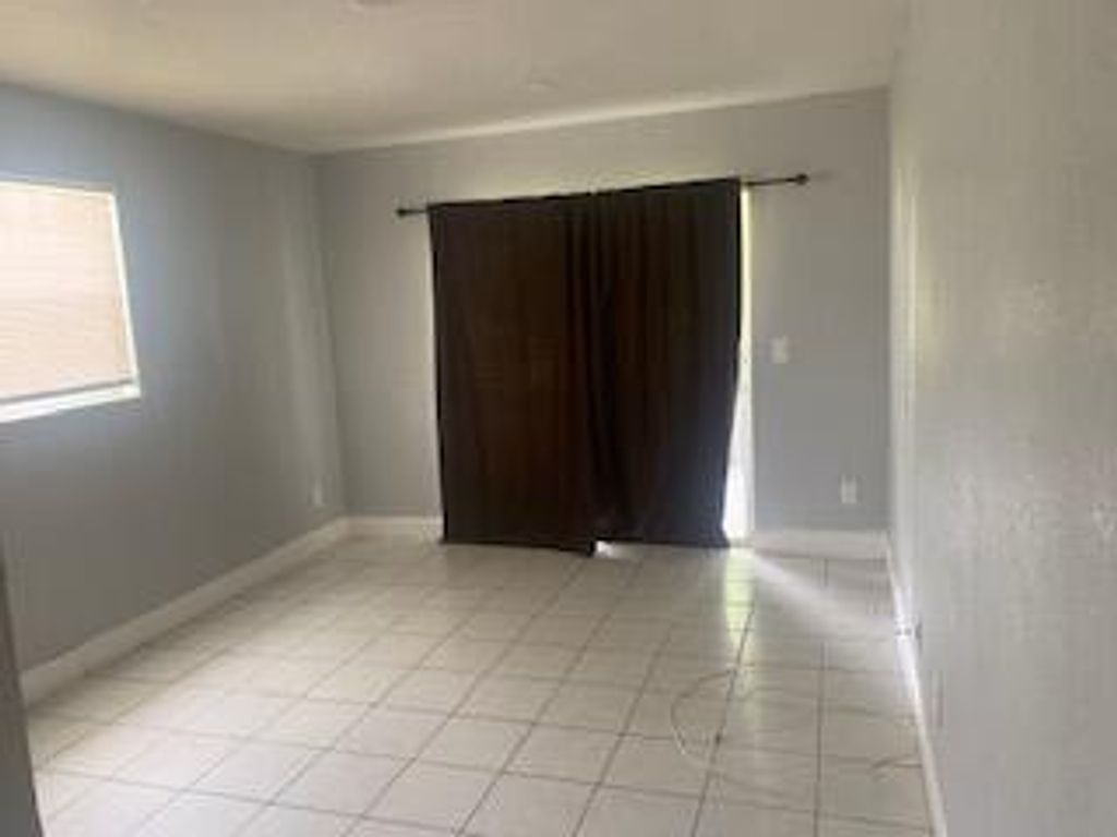 Photo of 1489 N Mangonia Circle, West Palm Beach, FL 33401 (MLS # R11117590)