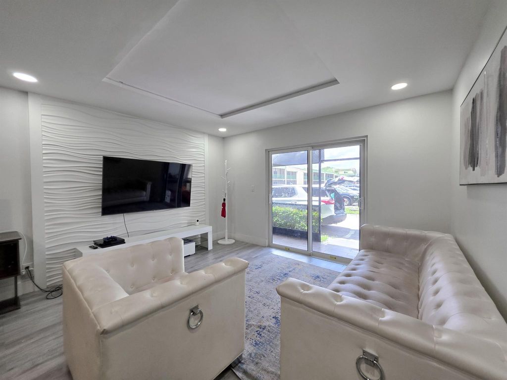 Photo of 4121 NW 88th Avenue #106, Coral Springs, FL 33065 (MLS # R11110841)