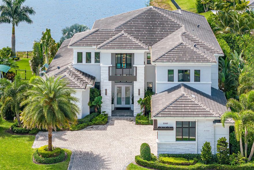 An unmatched residential offering. An exceptional opportunity awaits in Boca Raton! This sprawling custom Delanna II model boasts over 5500 square feet, 6 bedrooms including two master suites, a home office, bonus room, a loft, 3 car garage, full house generator, reverse osmosis water system, Control 4 smart home system & more. Situated on one of the most desirable lots within the community.  Southern exposure with long lake views complete with salt water pool, summer kitchen and putting green. Built in 2020 by Toll Brothers and custom designed interiors by Miami's own IG Workshop, this estate home oozes with well thought aesthetics and modern sophistication. A true design master piece. Turn Key optionality.