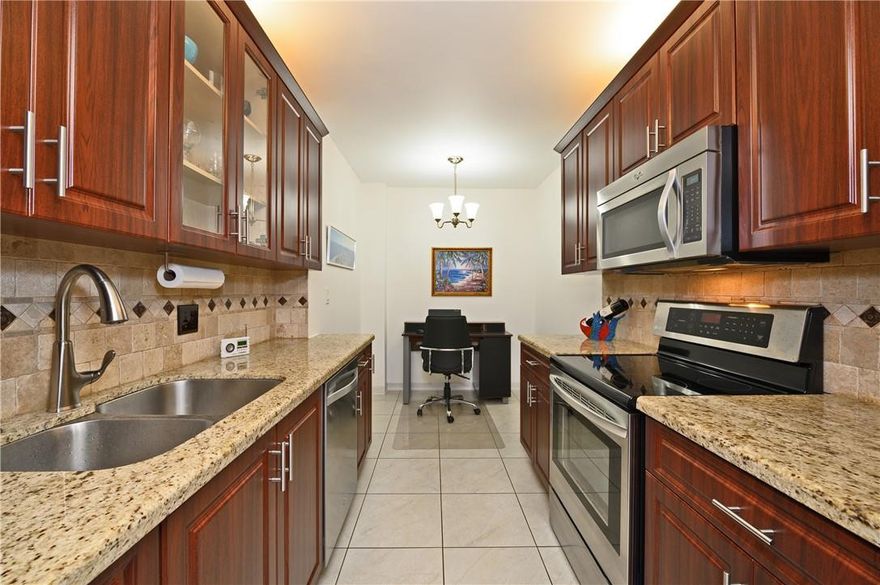 All ages welcome! Come tour this flawless upgraded 8th floor unit w/natural lighting & lovely south facing views of lakes and expansive nearby trendy downtown Hollywood, Miami & FLL. This condo features; tile throughout; kitchen with granite countertops, beige backsplash, mocha shaker cabinets, SS LG refrigerator & oven/range, Whirlpool microwave & dishwasher; bathrooms have new vanities; master walk-in closet; large screened in balcony perfect for entertaining guests. Perfectly maintained & well managed bldg w/lots of amenities like 24 hour security, front desk, heated pool & jacuzzi. In proximity to 95 & tpk, shops, beach, boardwalk, golf, casinos & much more! Enjoy it's new walking paths, lakes, parks, tennis & rec room w BBQ. Priced to Sell!