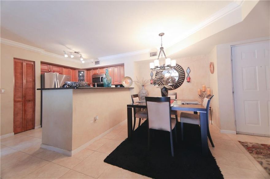 Beautiful First Floor Unit in desirable Gated community of Carrington at Coconut Creek. This two bedroom, two full bathroom Corner Unit has been remodeled! Kitchen has been fully updated with an Open Concept, Stainless Steel Appliances, new Kitchen Cabinets & quartz countertops! Spacious Living & Dining Rooms have tile flooring and are perfect for Entertaining! Large Master Bedroom has Wood Flooring and renovated Full Bathroom with Marble. Guest Bedroom is large and has renovated Full Bathroom! Washer & Dryer inside the Unit! Cozy screened patio! Unit has a Garage space!