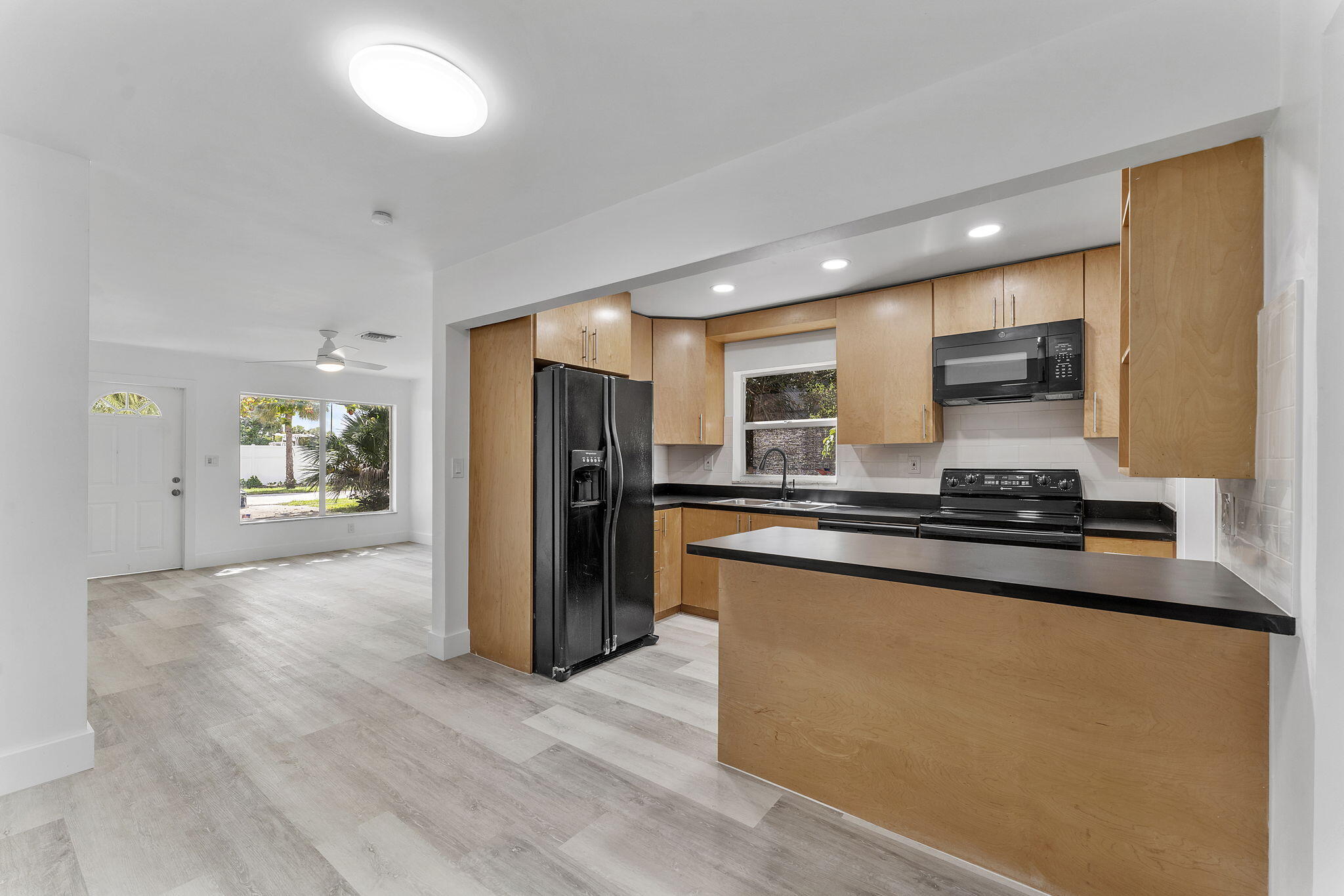 Step into your own private retreat with this fully remodeled 4-bedroom, 2-bath modern oasis home on a massive oversized corner lot. Surrounded by lush trees and complete with a huge fenced-in yard, this property offers privacy, space, and tranquility. Inside, enjoy brand-new kitchens and bathrooms, a split bedroom floor plan for comfort, and stylish modern finishes throughout. Minutes from world-class dining, shopping, beaches, and all the amenities Deerfield Beach has to offer, this home is the perfect blend of luxury, convenience, and seclusion. Professionally managed for optimal customer service