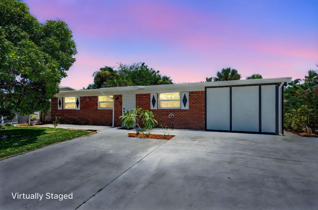 Photo of 3852 Catalina Road, Palm Beach Gardens, FL 33410 (MLS # R11117338)