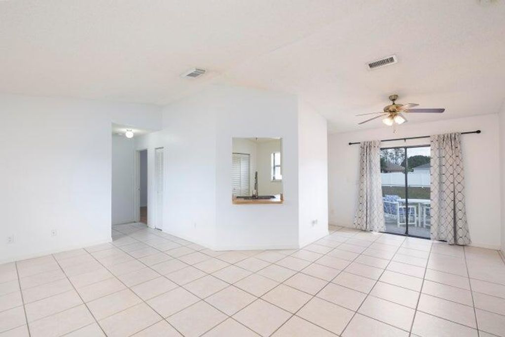 Photo of 643 SW Duval Avenue, Port Saint Lucie, FL 34983 (MLS # R11167493)