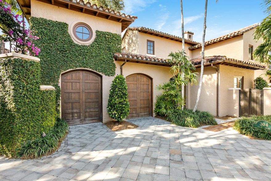 Perfectly positioned on the 18th hole in The Bear's Club, this 4-bedroom, 4.1-bath golf villa meets effortless luxury living. Completely reimagined by a premier Palm Beach County builder and offered fully furnished with exquisite designer interiors by Pineapples & Palms of Jupiter. Sun-filled spaces feature custom cabinetry, Wolf and Subzero appliances, Waterworks fixtures, Dolomite marble in the spa-like primary bath, tongue-and-groove ceilings, shiplap walls, Starke carpets, and curated designer wallpaper throughout. Every bath has been thoughtfully redesigned with elegant details. Step outside to your private pool overlooking manicured fairway and lake views—an elegant, turnkey villa in one of Jupiter's most exclusive communities.