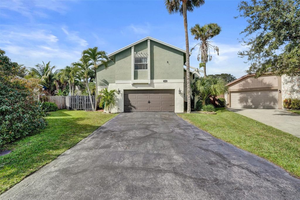 Photo of 3808 NW 73rd Way, Coral Springs, FL 33065 (MLS # F10548052)