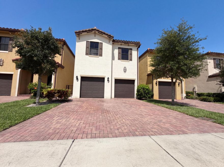 Come see 5213 NW 50th Ter, a residence designed for everyday practicality and comfort. The kitchen includes all stainless steel appliances and a functional island. The primary bathroom features double sinks and a separate tub and shower. The primary bedroom has a walk in closet. A patio extends the living space. This comfortable, functional design is a must-see. Included 100-Day Home Warranty with buyer activation