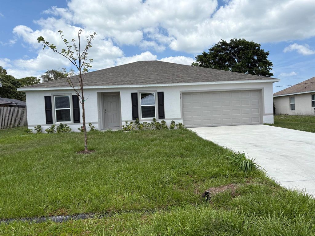 Photo of 315 NE Granduer Avenue, Port Saint Lucie, FL 34983 (MLS # R11093366)