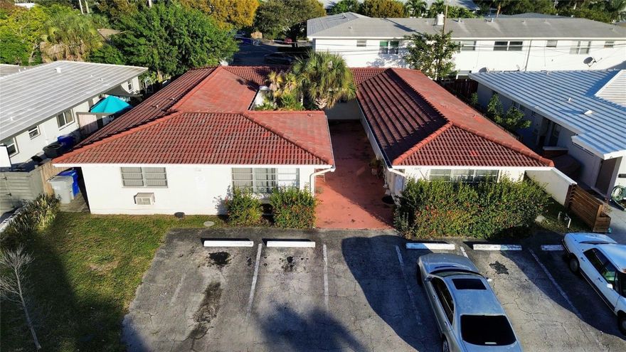 Great investment opportunity to own a 4-plex east of US1 in Pompano Beach!! 2855' under air. Individually metered. Tile Roof (2002). Common area laundry. 6 parking spaces. Less than 1 mile to the beach!! Enjoy restaurants, shopping, golf beaches & so much more! Property is three one bed one bath units and two studio units.
