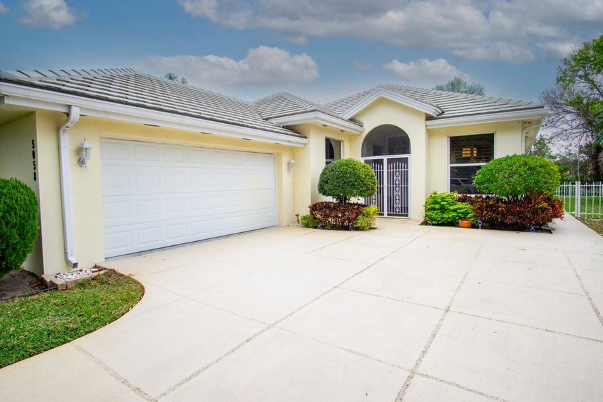 Nestled in the tranquil Lost Lake Community of The Preserve at Hobe Sound, this charming 3-bedroom, 2-bath Hampton model home offers the perfect blend of comfort and elegance. Boasting 2,017 square feet of air-conditioned living space and an additional 480 square feet for a two-car garage and covered entry, this home is designed for both functionality and style. The upgraded kitchen and bathrooms add a modern touch, while 10-foot ceilings, expansive windows, and skylights in the bathrooms and laundry room create a bright, airy atmosphere. The split-bedroom floor plan offers generous room sizes, providing privacy and comfort. Enjoy your morning coffee in the separate eat-in breakfast area or entertain in the spacious family room. Concessions being offered for replacing polybutylene pipes.  This is a gated community with tree-lined streets, peaceful preserve views, and ultimate privacy. The property backs up to the Preserve, offering serene views and no neighbors directly behind and a full-fenced yard - perfect for your furry family members to play freely. This environmentally conscious community is designed to harmonize with nature, offering lush landscapes, lakes, and scenic water views. Residents enjoy a variety of on-site recreational amenities, including a swimming pool, tennis courts, shuffleboard, bocce ball, and a basketball court. Located just two miles from the Atlantic Ocean, 30 minutes from the Palm Beaches, and with easy access to major roads like I-95 and the Florida Turnpike, this home is perfect for anyone seeking a peaceful lifestyle with convenience. Top-rated Martin County Schools, proximity to premier golf courses, public boat ramps, and beaches make it an ideal choice for families or anyone seeking to enjoy the best of Hobe Sound. Embrace the sunshine state lifestyle in a town that boasts an A+ crime rating, excellent air quality, and an average temperature of 76 degrees. With no state income tax, it's easy to see why Hobe Sound ranks as one of the top beach town housing markets in Florida.