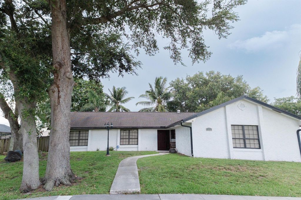 Photo of 420 La Mancha Avenue, Royal Palm Beach, FL 33411 (MLS # R11129422)