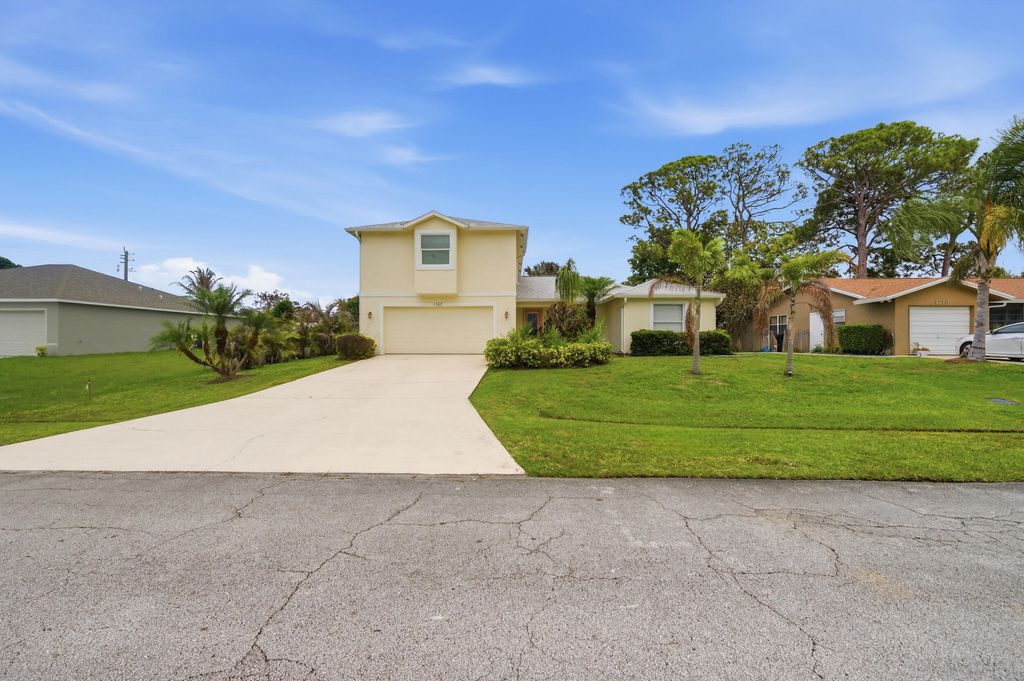 Photo of 1707 SE Manth Lane, Port Saint Lucie, FL 34983 (MLS # B26017917)
