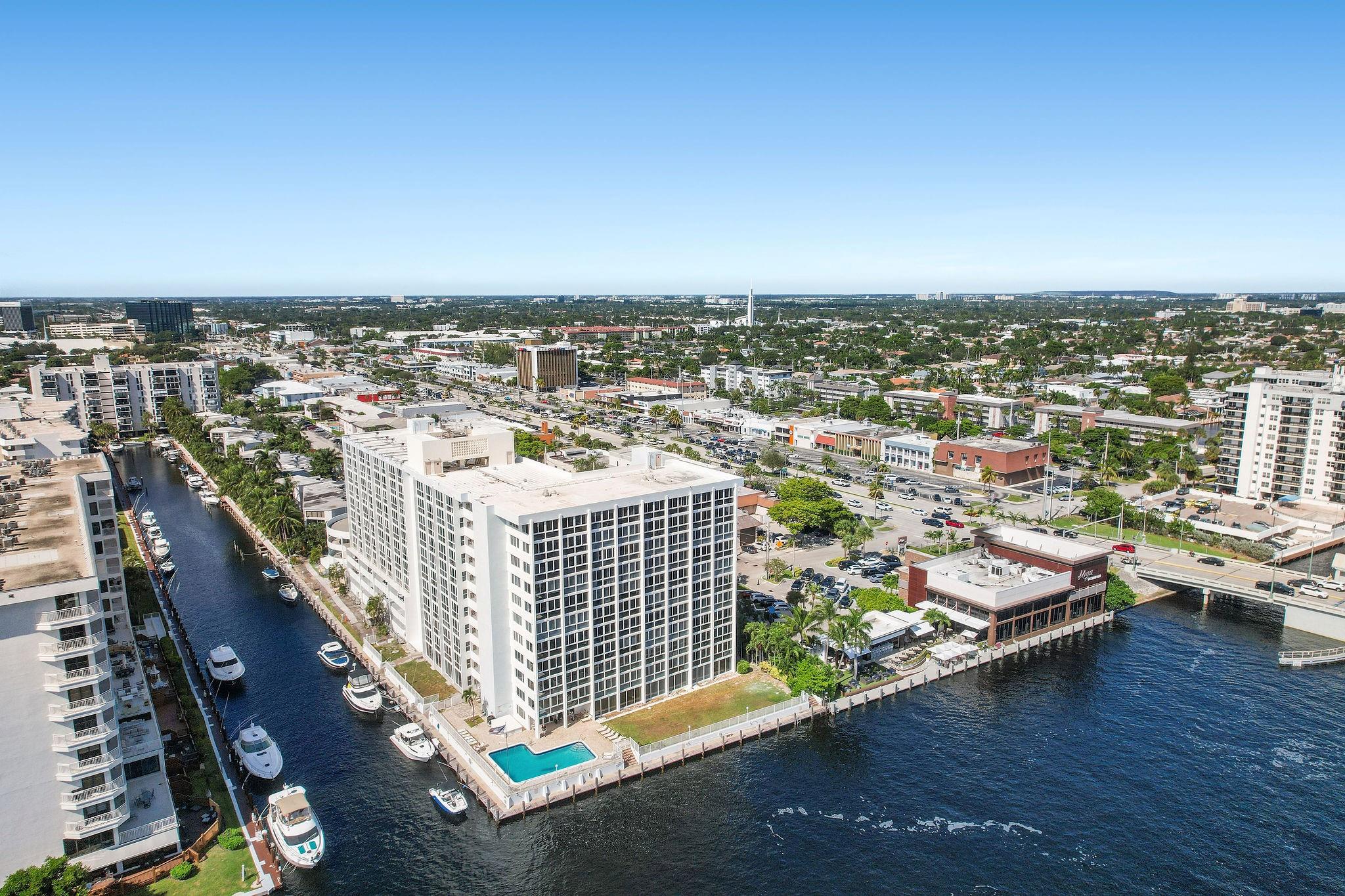2 garage parking spaces! Enjoy breathtaking sunset views from this large high floor southwest corner condo. Brand new impact rated floor to ceiling windows overlook yachts docked along the canal below and to the west and boats traveling along the intracoastal to the east. Views of the ocean in Lauderdale By The Sea can be seen in the horizon a 1/2 mile to the east. Located immediately west of the bridge, and steps away from the beach. The pool is smack on the intracoastal waterway. Partially furnished.