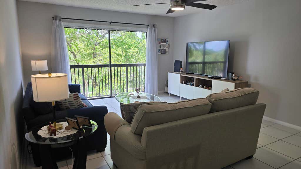 Photo of 4965 E SABAL PALM Boulevard #403, Tamarac, FL 33319 (MLS # B26053391)