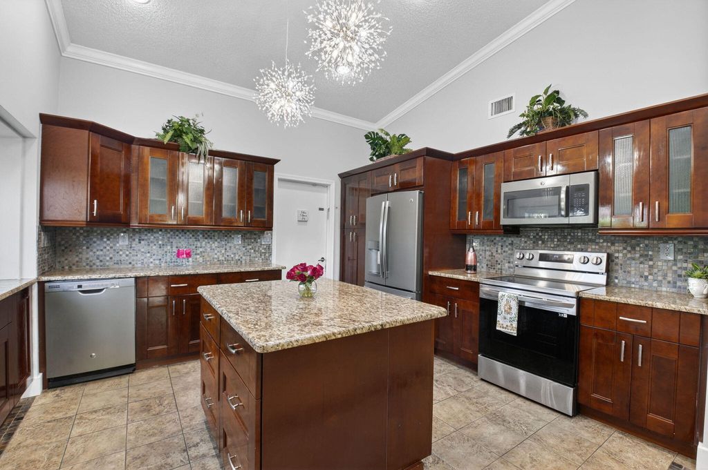 Photo of 1290 NW 21st Terrace, Delray Beach, FL 33445 (MLS # R11148437)