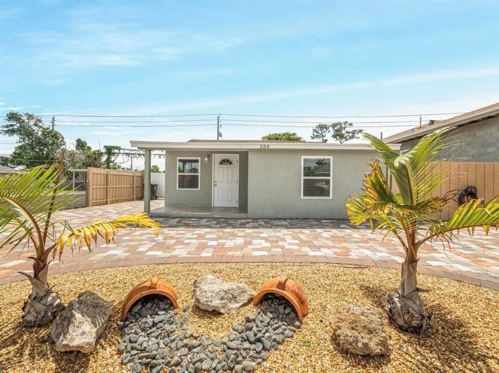 Photo of 334 Jackson Avenue, Greenacres, FL 33463 (MLS # R10884021)