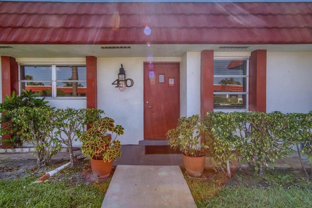 Photo of 5800 W Fernley Dr Drive W #40, Greenacres, FL 33415 (MLS # B26025090)