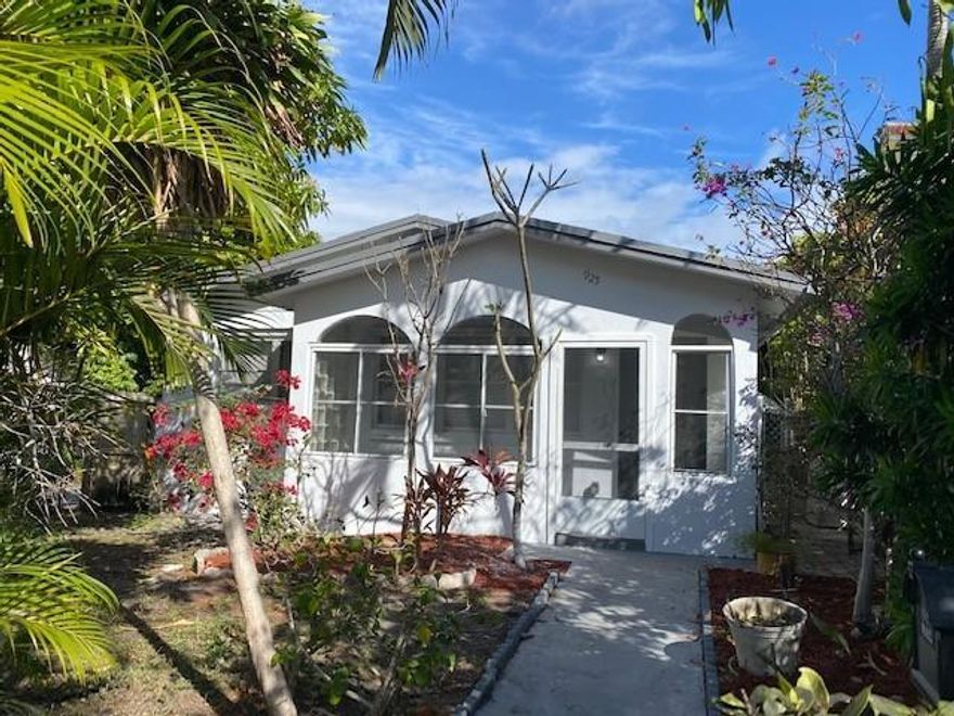 Beautiful renovated large concrete block 4 bedroom home in the heart of Northwood! Wood flooring throughout! New kitchen with quartz counters and stainless steel appliances! Designer upgraded baths!