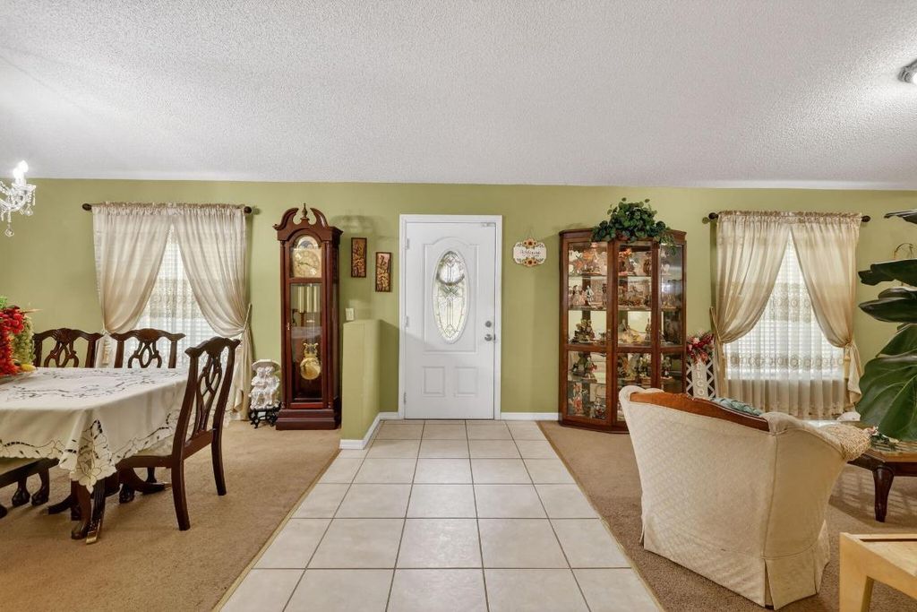 Photo of 3161 SW Hambrick Street, Port Saint Lucie, FL 34953 (MLS # R11154458)