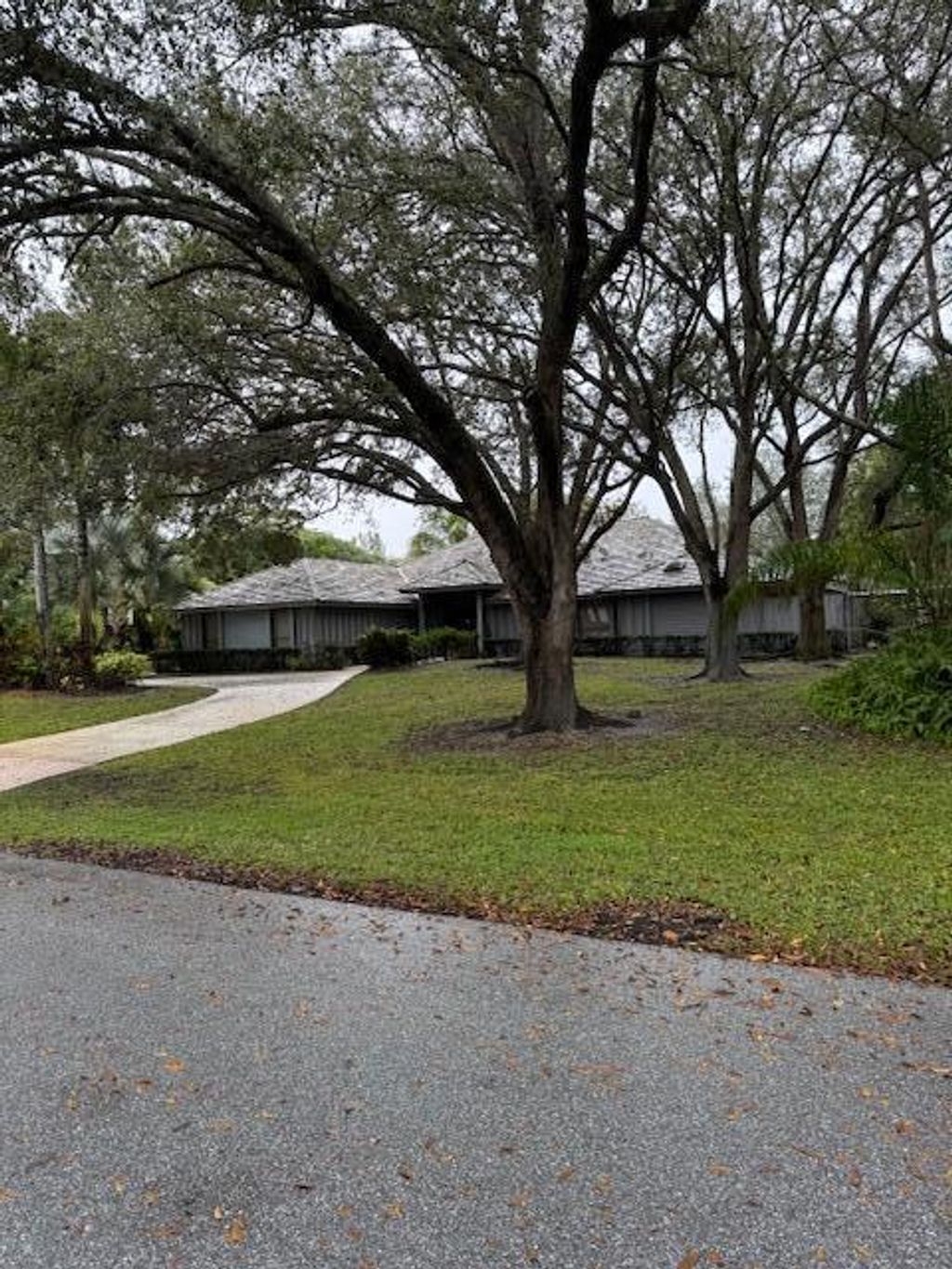 Photo of 5781 Whirlaway Road, Palm Beach Gardens, FL 33418 (MLS # R11054964)