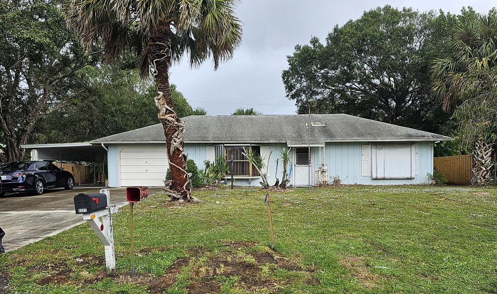 Photo of 8002 Deland Avenue, Fort Pierce, FL 34951 (MLS # R10938414)