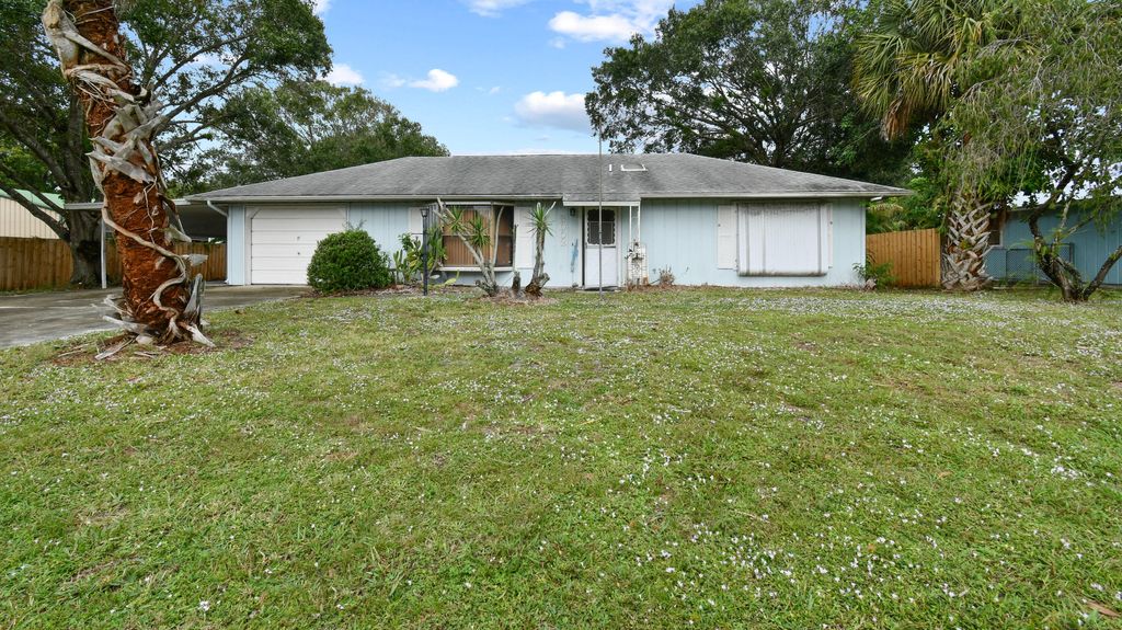 Photo of 8002 Deland Avenue, Fort Pierce, FL 34951 (MLS # R10938414)