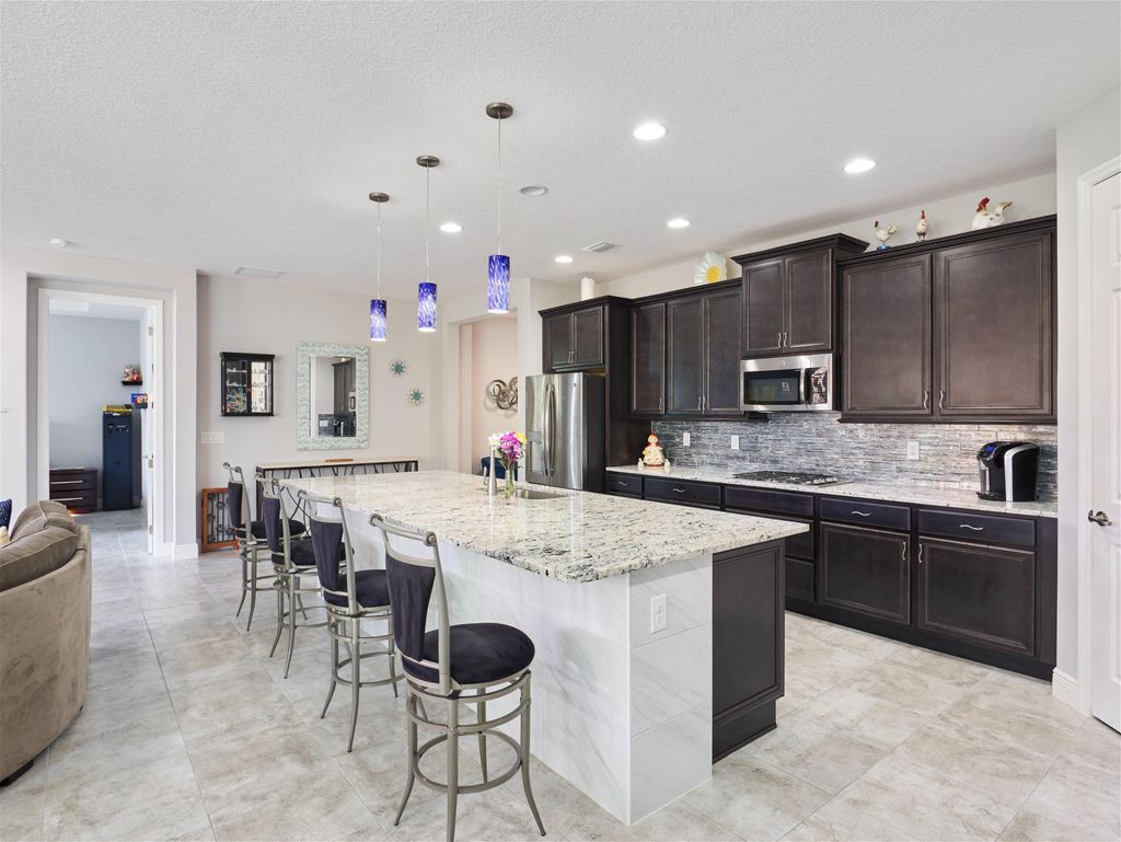 Photo of 10095 SW Oak Tree Circle, Port Saint Lucie, FL 34987 (MLS # R11168548)