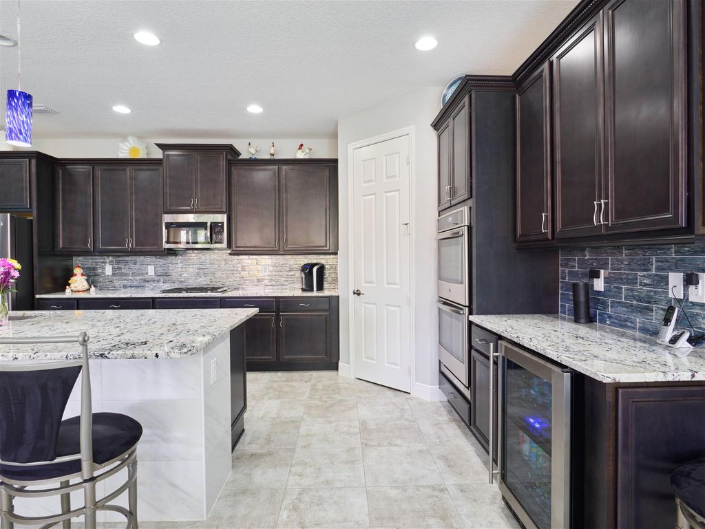 Photo of 10095 SW Oak Tree Circle, Port Saint Lucie, FL 34987 (MLS # R11168548)