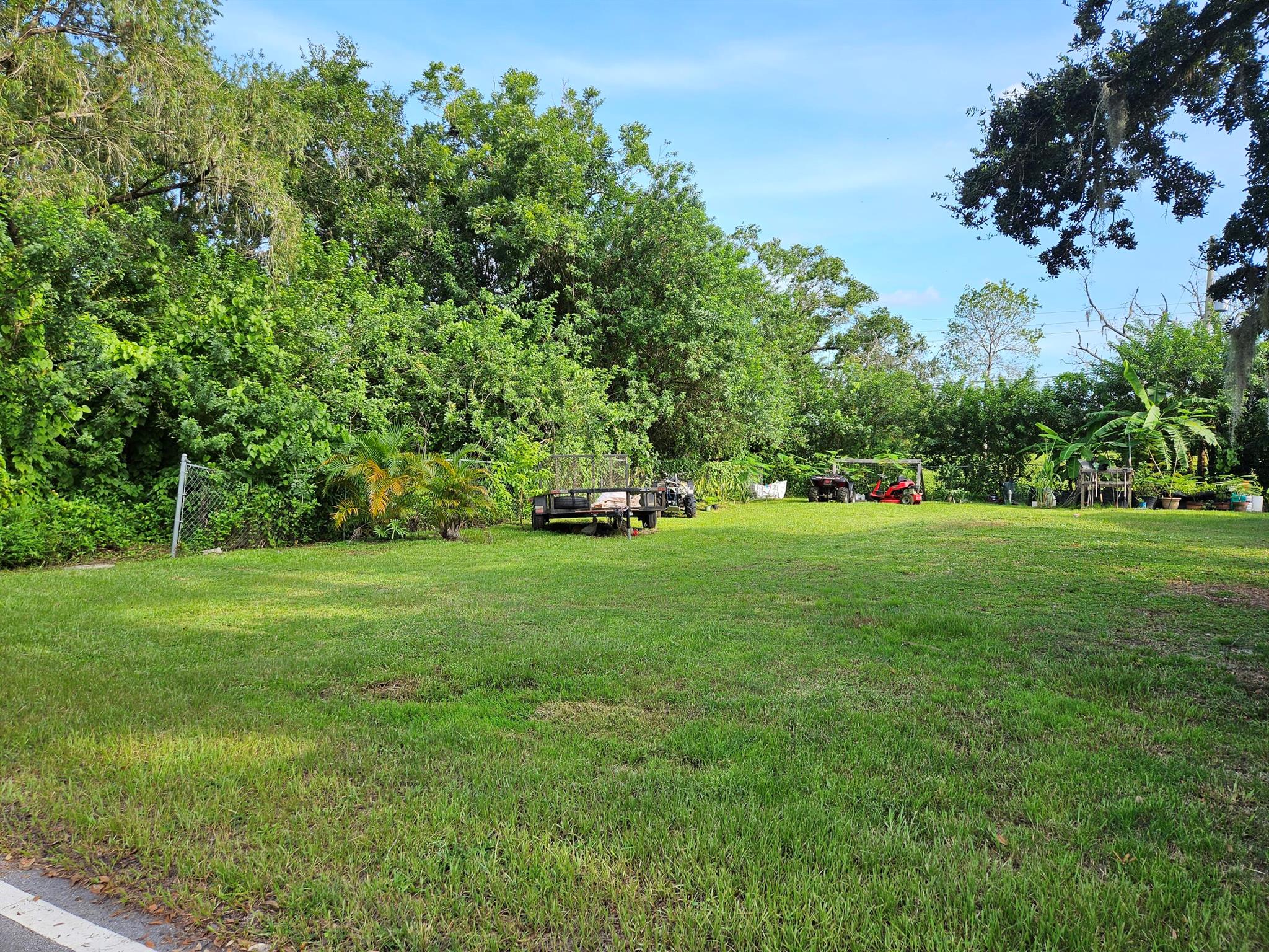 40X90 cleared land, No HOA, Paved Road, Near Freshwater, Brackishwater, and Saltwater for fishing and water activities. 20 minutes to Stick Marsh/Farm 13 Reservoir known for best bass fishing, 20 minutes to Indian River Lagoon/Intercoastal Waterway, 25 minutes to Atlantic Ocean. Great location for year-round living or seasonal. List of local builders available. Buyer to bring in water/sewer/septic connections, none on site. ''Owner is FREC Registered''. Building requirements are at least 1,000 sq ft residence with 2 car enclosed garage and setbacks of 5ft on one side and 12 ft on other side. This may be a Modular Home with RDMH Certificate.