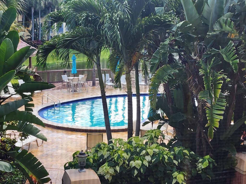 Photo of 700 Uno Lago Drive #202, Juno Beach, FL 33408 (MLS # R11101105)