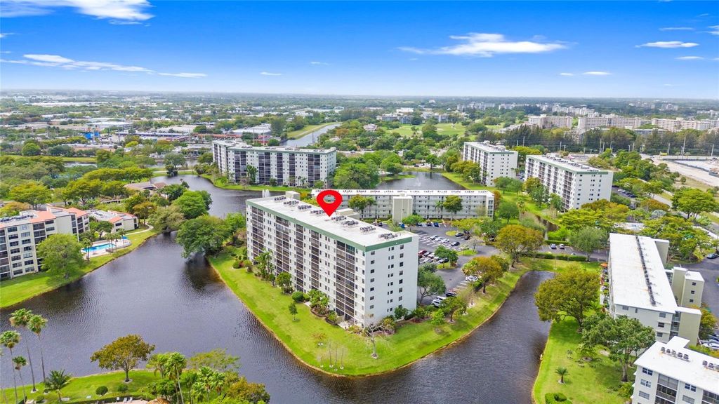 Photo of 2232 N Cypress Bend Drive #107, Pompano Beach, FL 33069 (MLS # F10540831)