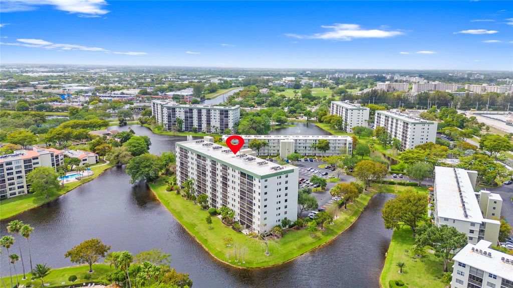 Photo of 2232 N Cypress Bend Drive #107, Pompano Beach, FL 33069 (MLS # F10540831)