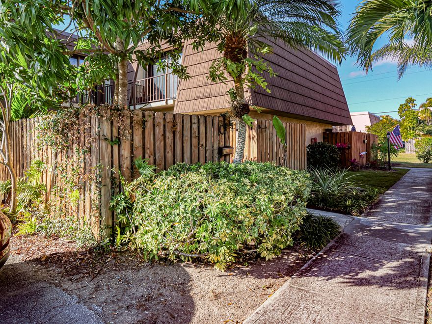 Coastal delight with paver patio, tropical plantings, and inside, tiled floors, updated kitchen and baths, and ready to move in to. Tropic Grove Villas is just 2 miles to beaches, and this Villa provides nearly 1200 sq ft of living space on 2 levels. First floor powder room has full sized washer and dryer included in sale. Lower association dues include outside maintenance. Central air is 6 years old. Home has accordion storm shutters in place. No age restrictions and pets are allowed.